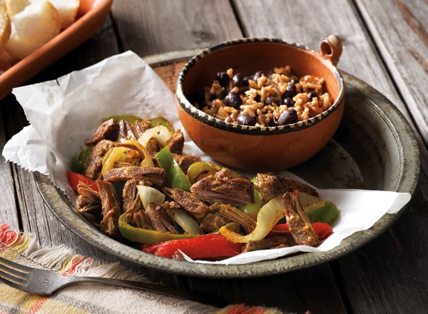 Fried Beef, Onions, and Peppers with Moros (Rice/Black Beans)