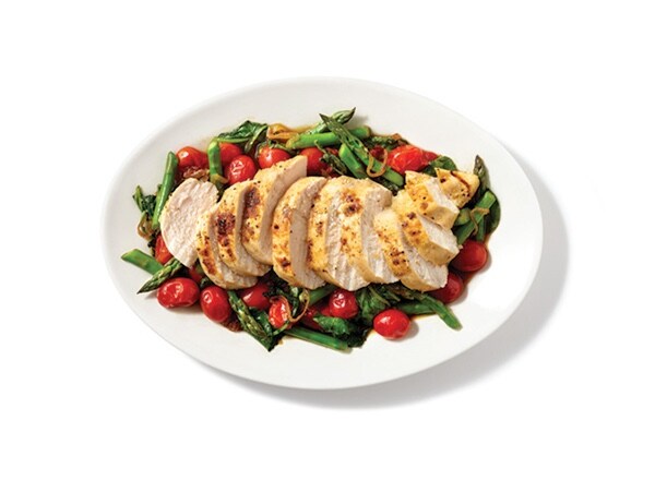 Chicken over Warm Kale and Asparagus Salad