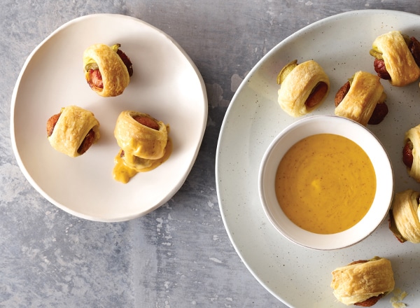 Pigtail Puffs with Queso Dip