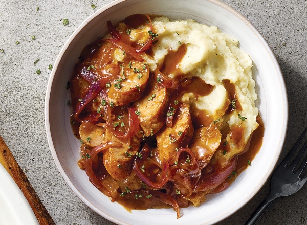 Sausages with Onion-Apple Gravy over Potatoes