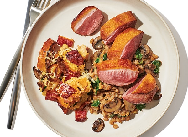 Pan-Roasted Duck with Mushroom Farro and Mushroom Bread Pudding