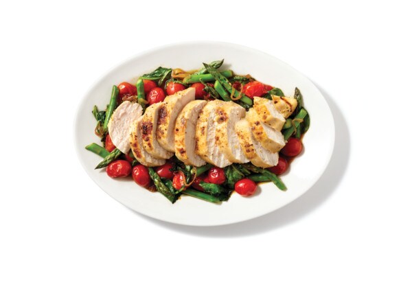 Chicken over Warm Kale and Asparagus Salad