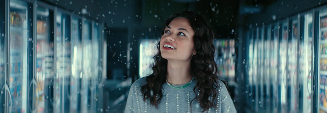 woman in grocery store aisle 