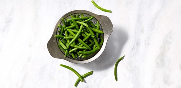 colander of green beans 