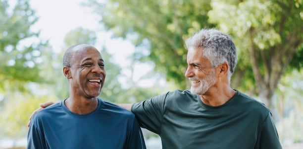 two men exercising together 