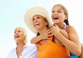 three generations of women smiling