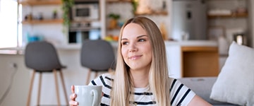 Woman holding a coffee cup