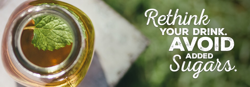 jar of iced tea with mint leaf