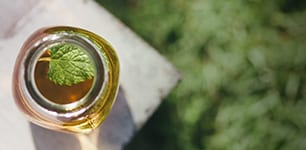 jar of iced tea with mint leaf