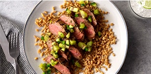 Marinated Steaks with Kiwi Relish over Farro