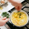 pan of eggs cooking on gas range