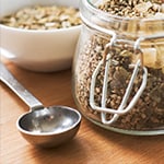 storage canister of food and measuring spoon