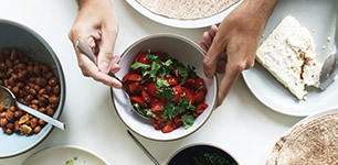 prepping bowls of food