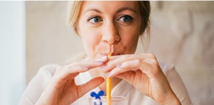 teen drinking smoothie