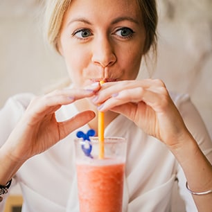 teen drinking smoothie