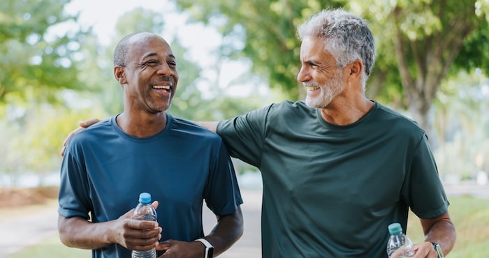two men exercising together 