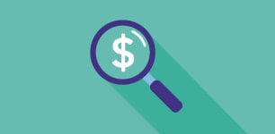 Magnifying glass with a dollar sign inside the glass