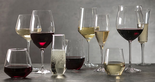 assortment of filled wine glasses