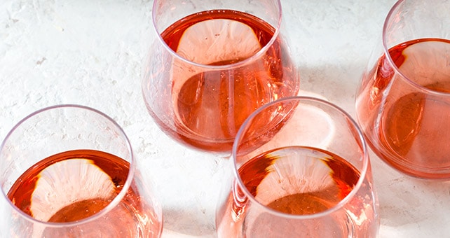 group of pink wine in glasses