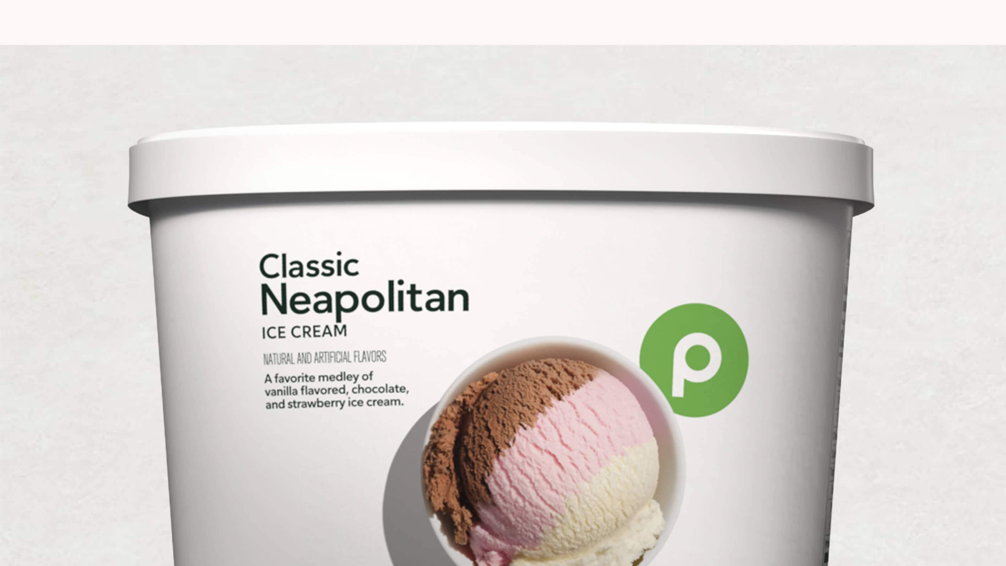 A tub of Publix Classic Neapolitan Ice Cream featuring vanilla, chocolate, and strawberry flavors with a scoop shown on the label.