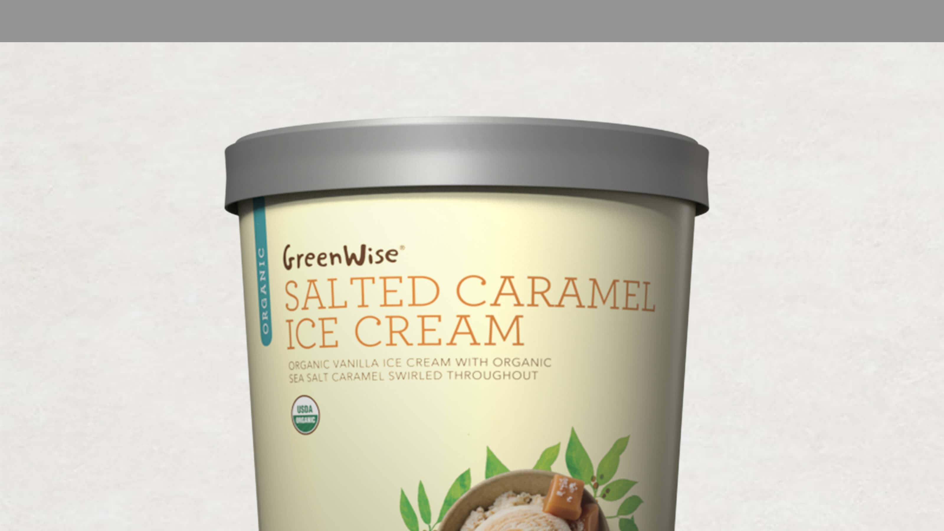 A tub of GreenWise Salted Caramel Ice Cream, featuring organic vanilla ice cream with organic sea salt caramel swirls.