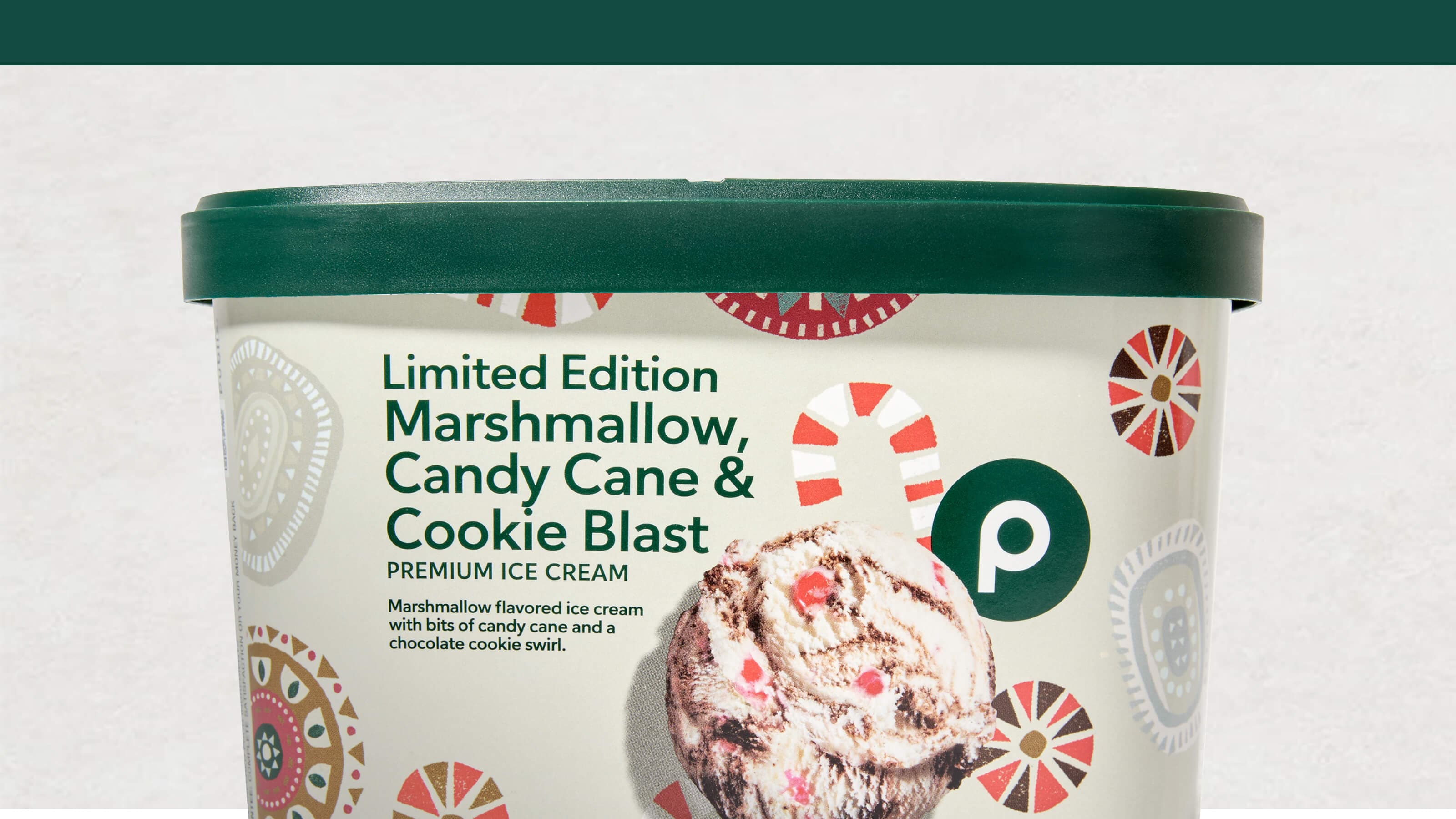 Publix Limited Edition Marshmallow, Candy Cane & Cookie Blast ice cream tub with festive designs and candy cane bits.