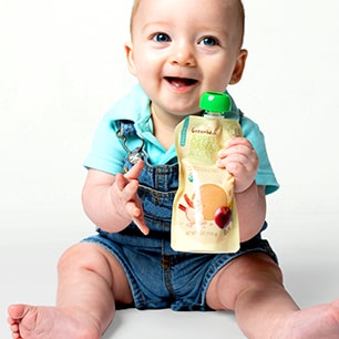 Baby eating GreenWise Baby Food