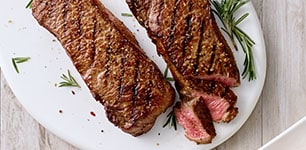 Grilled steak on a platter