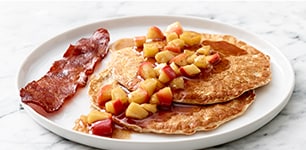 Bacon and pancakes on plate