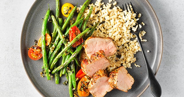 Skillet Herb-Crusted Pork with Blistered Beans & Tomatoes