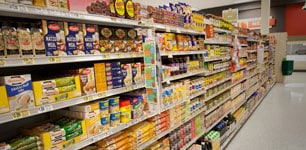 stocked grocery aisle shelves