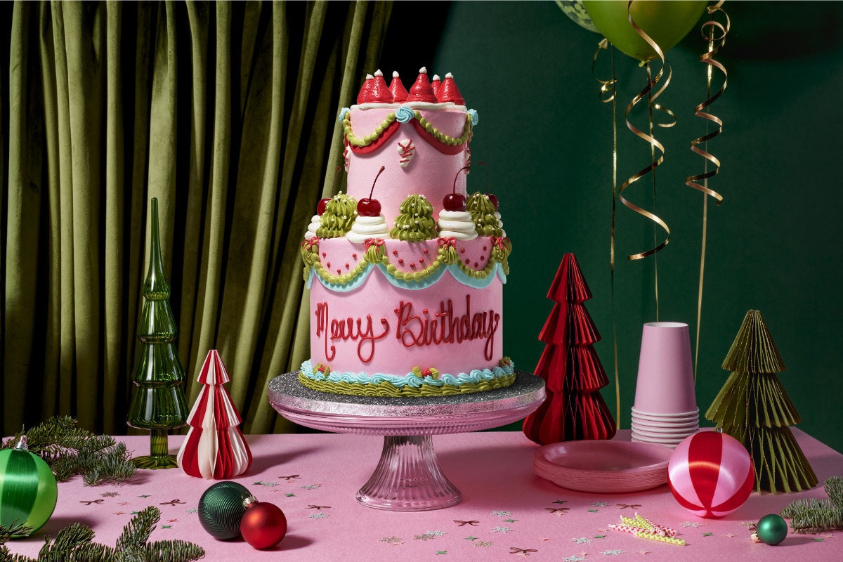 Merry Birthday Cake in a festive setting.