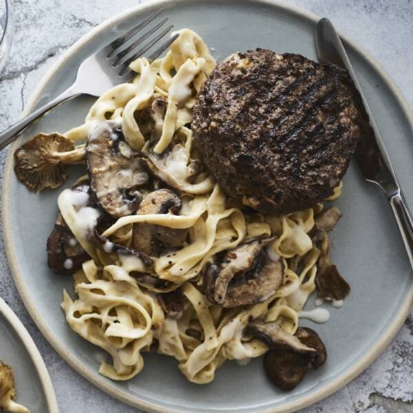 Bleu Cheese & PeppercornStuffed Beef over Mushroom Fettuccini Alfredo