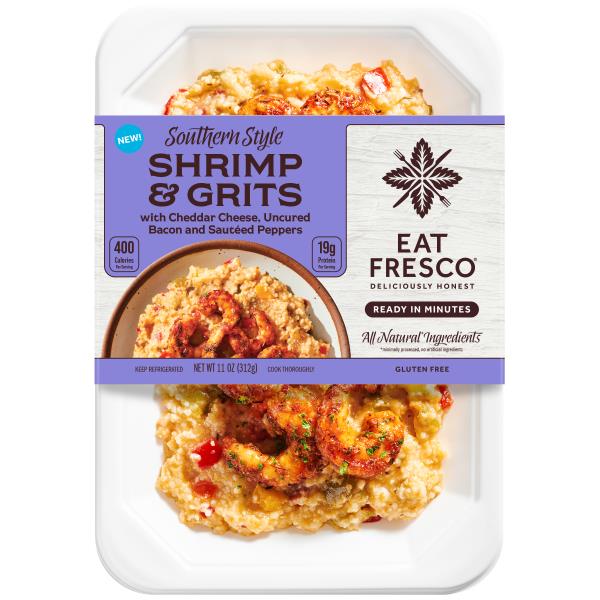 Eat Fresco Seasoned shrimp over cheesy grits with bacon and sautéed